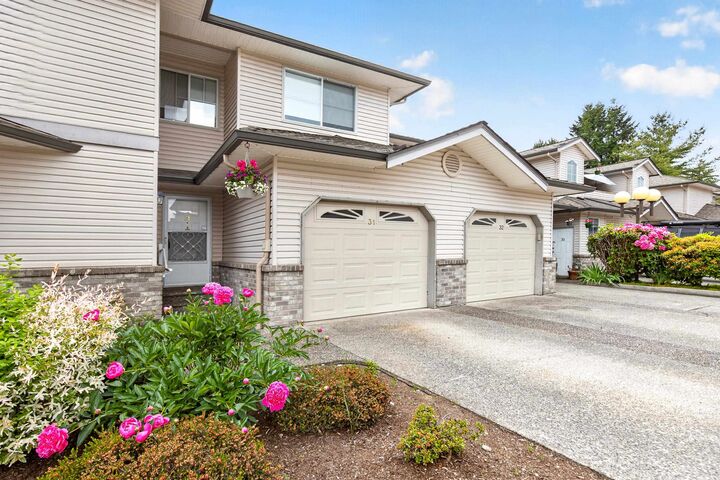 Property Photo: 19060 Ford Road 31 BC V3Y 2M2