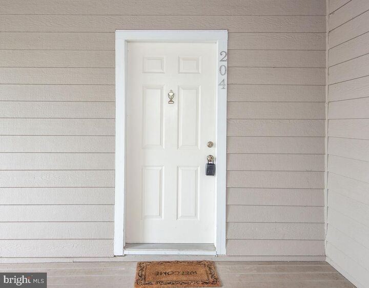 Property Photo:  14321 Climbing Rose Way 204  VA 20121 