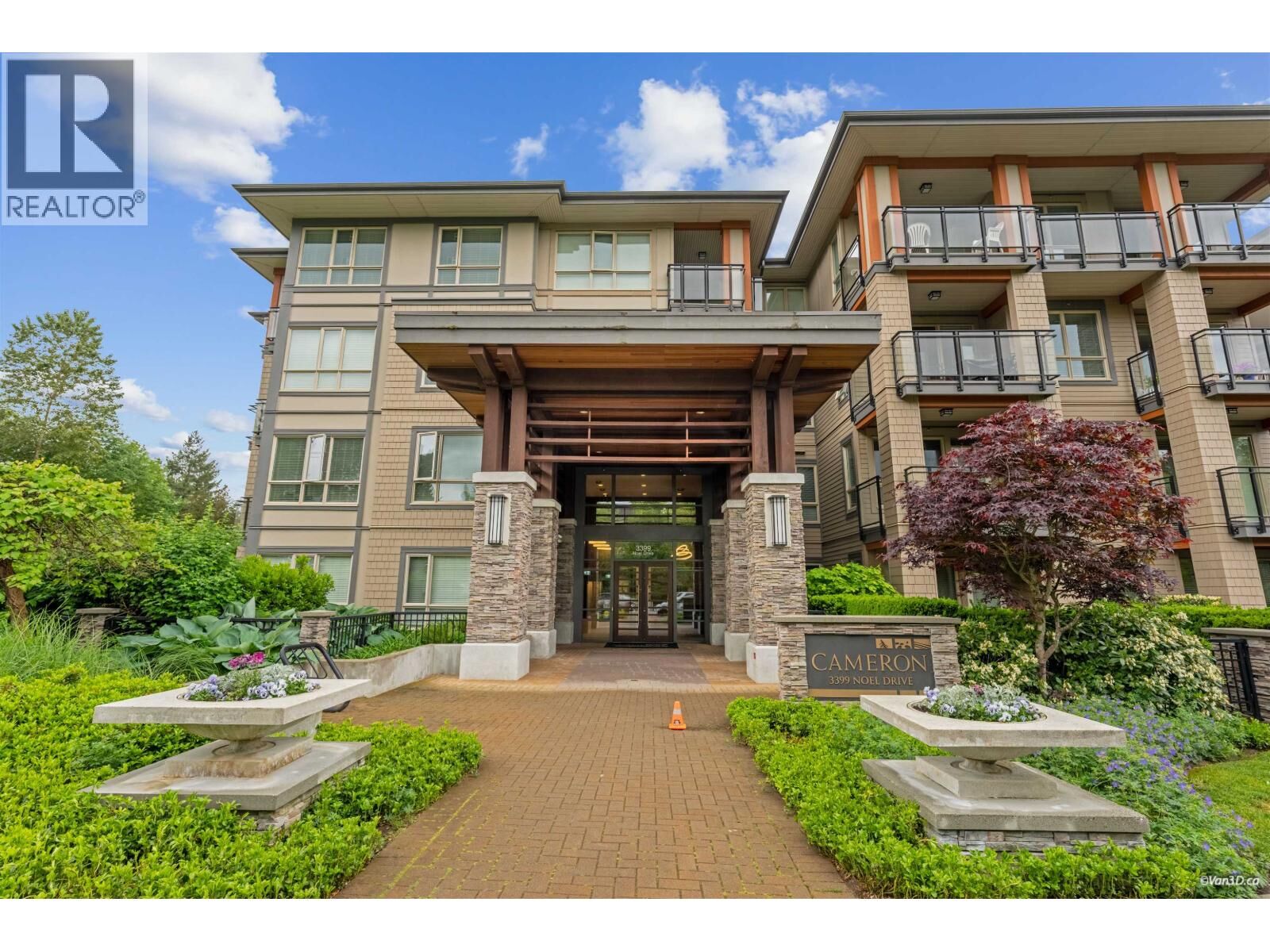 Property Photo: 3399 Noel Drive 411 BC V3J 0G8