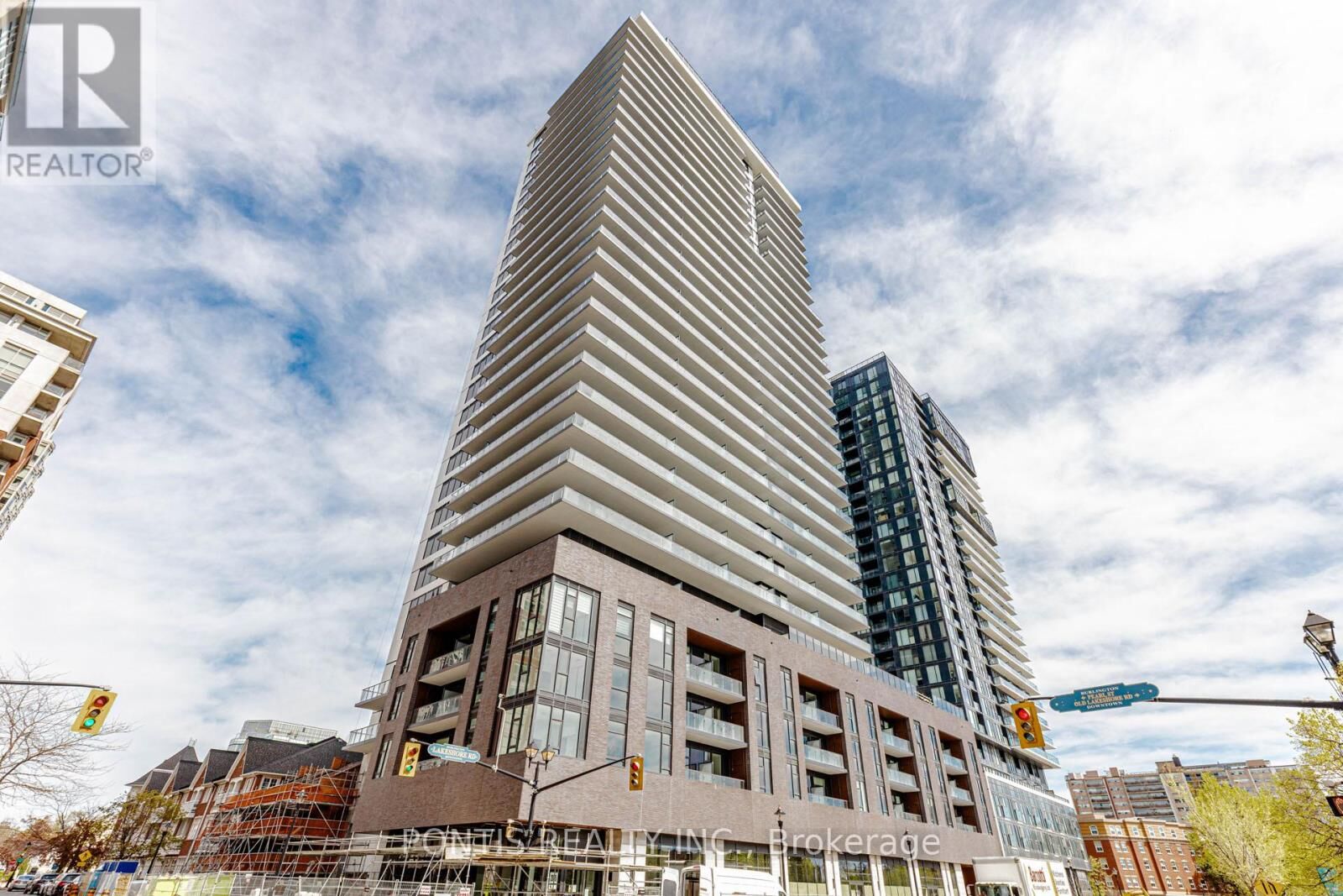 Property Photo: 2075 Lakeshore Road 404 ON L7R 1E2