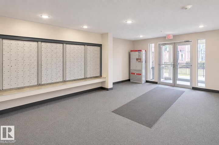 Property Photo: 11325 83 Street NW 310 AB T5B 4W5