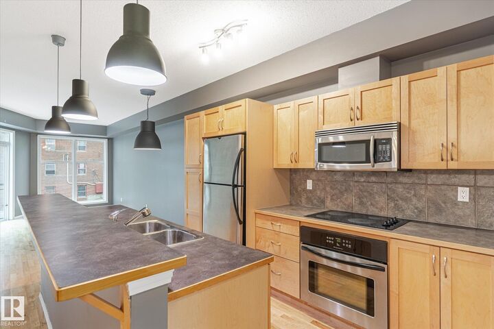 Property Photo:  10503 98 Avenue NW 511  AB T5K 0B2 