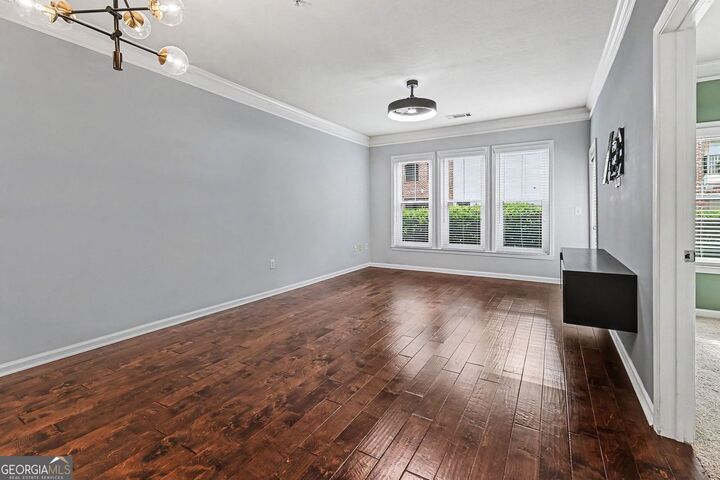 Property Photo:  1850 Cotillion Drive 2102  GA 30338 