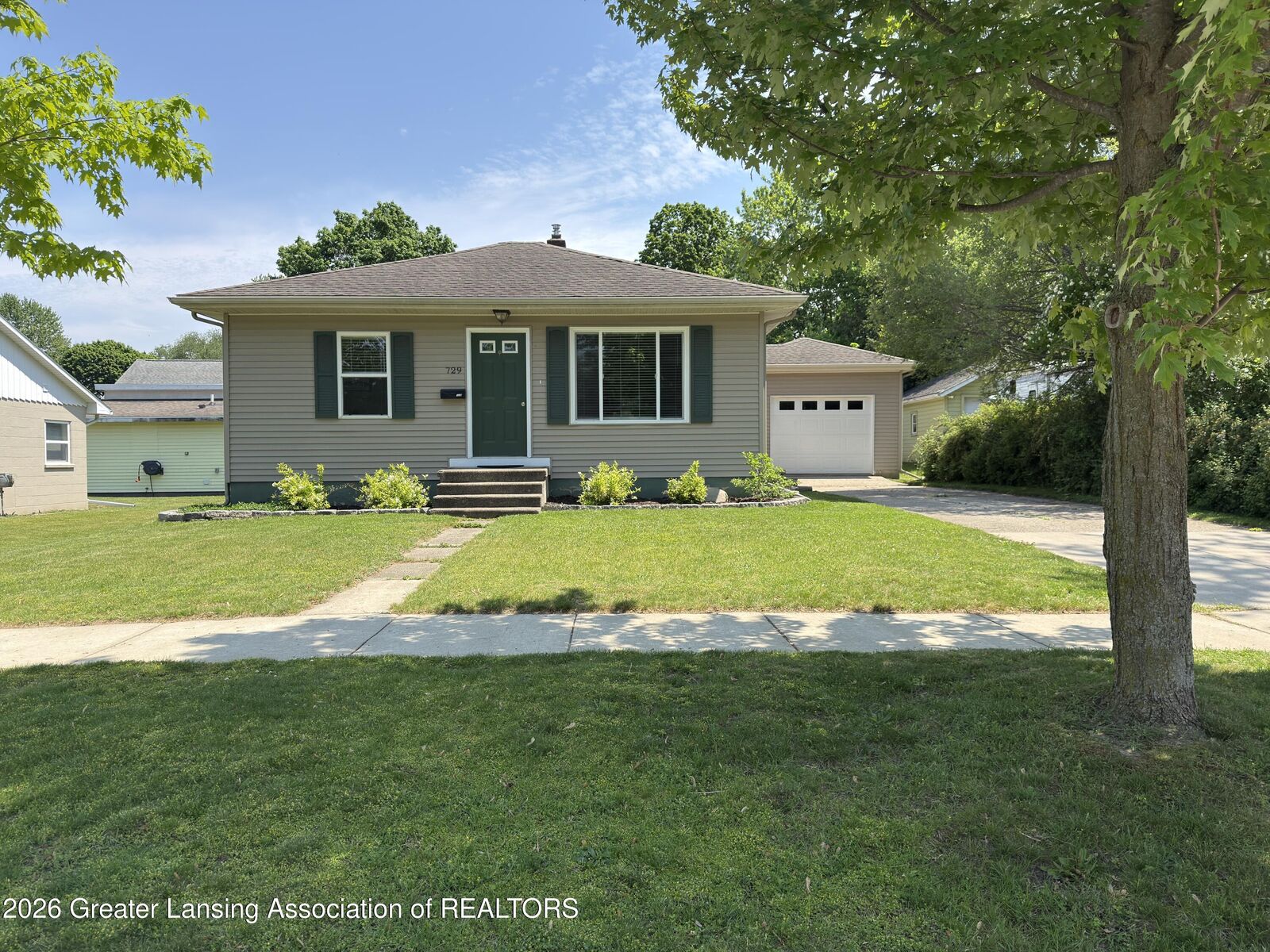 Property Photo:  729 Riverside Drive  MI 48875 