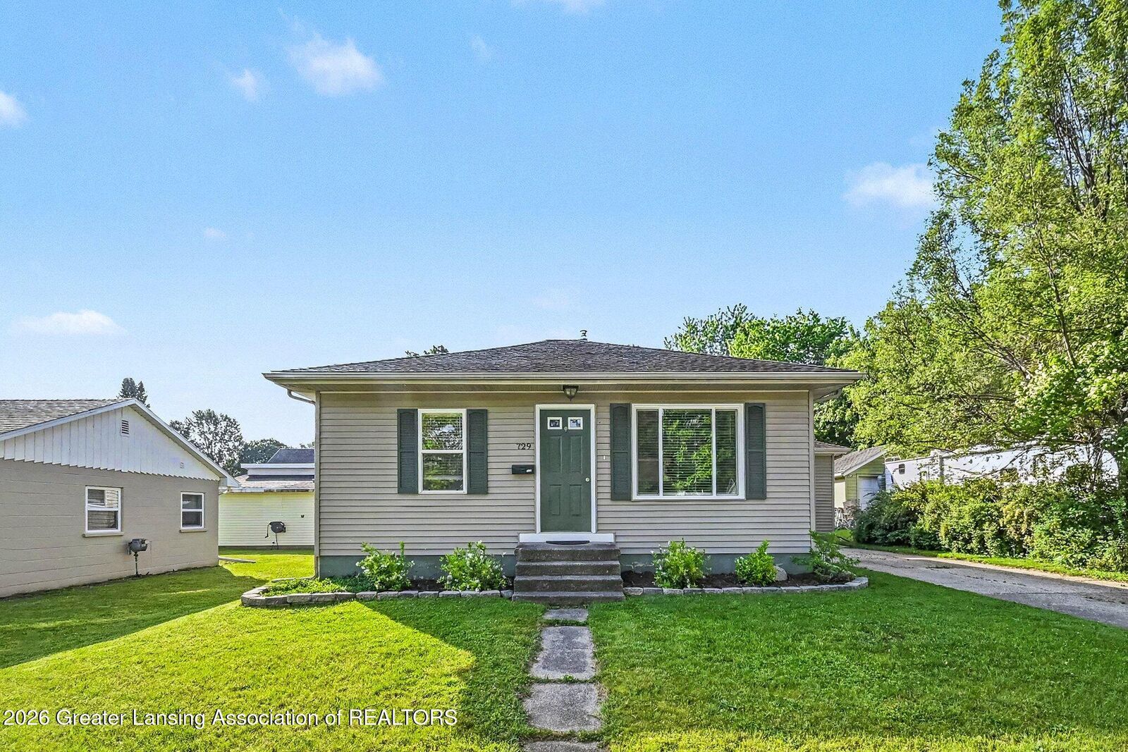 Property Photo: 729 Riverside Drive MI 48875