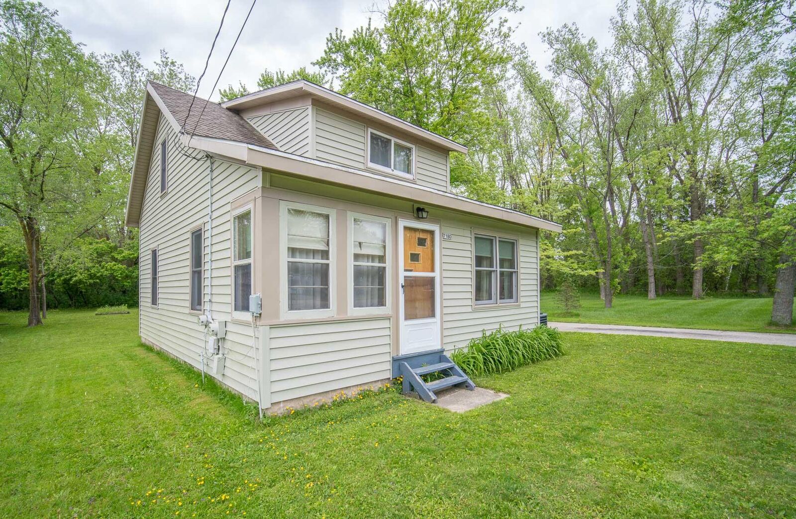 Property Photo:  7180 N River Rd  WI 53090 