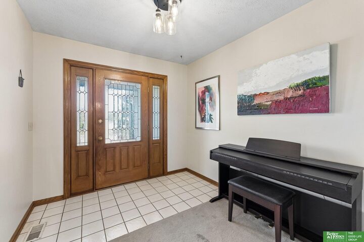 Property Photo:  1209 Cottonwood Circle  NE 68133 