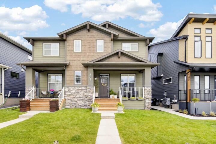 Property Photo: 564 Rowmont Boulevard NW AB T3L 0L6