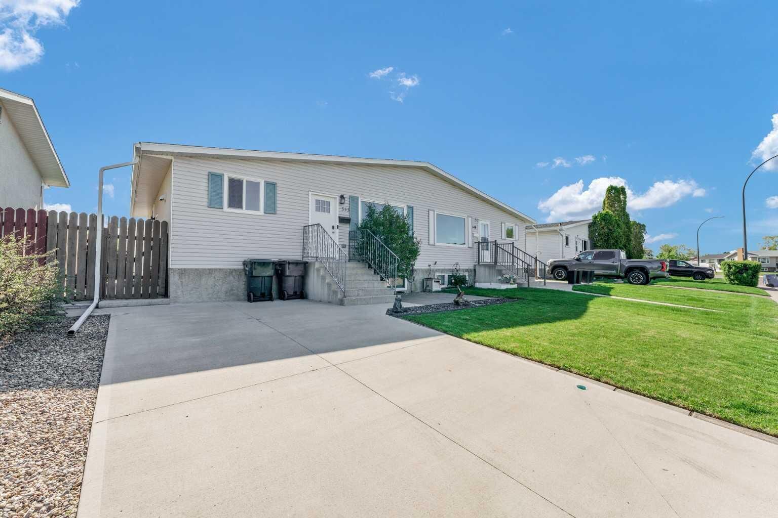 Property Photo:  353 Ross Glen Drive SE  AB T1B 1Y3 