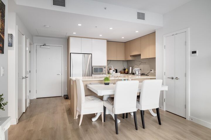 Property Photo:  567 Clarke Road 3002  BC V3J 0K7 