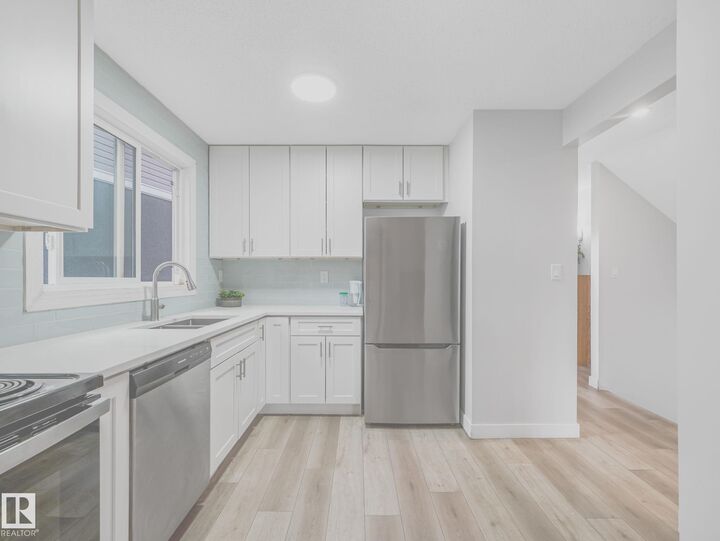 Property Photo: 550 Lakewood Road NW AB T6K 3Y1