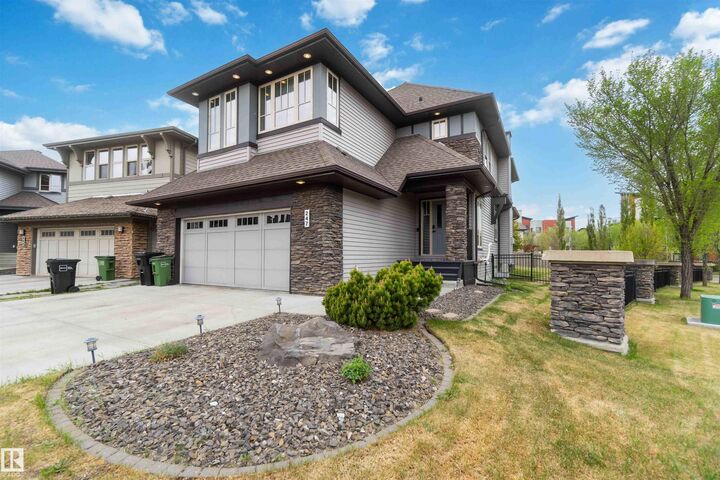 Property Photo: 247 Ambleside Drive SW AB T6W 0H3