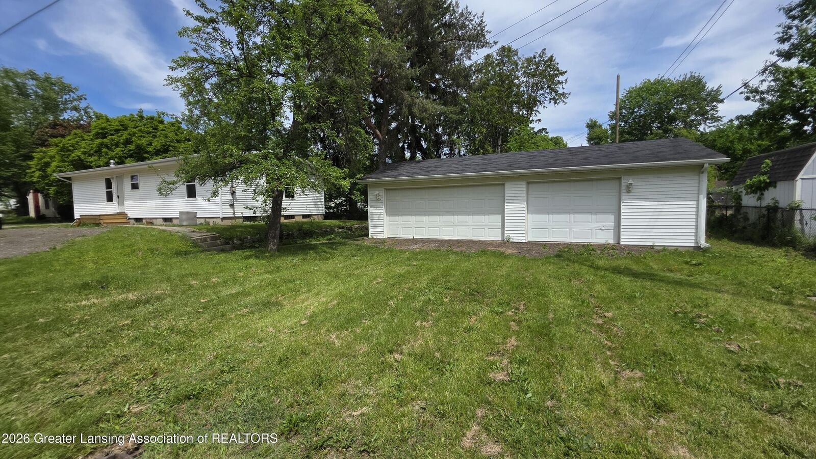 Property Photo:  825 Dunlap Street  MI 48910 