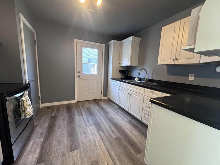 Property Photo:  124 7th Ave SE  IA 50662 