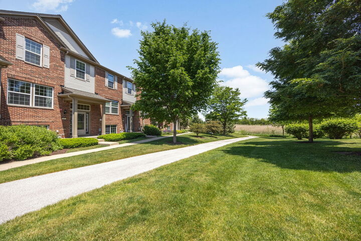 Property Photo: 302 Devoe Drive IL 60543