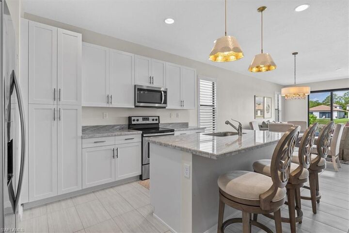 Property Photo: 8968 Madrid Cir FL 34104