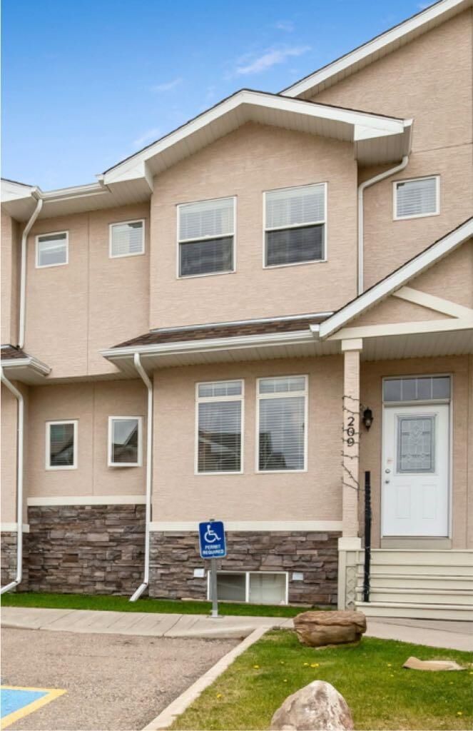 Property Photo: 209 Strathcona Circle AB T1P 0B1