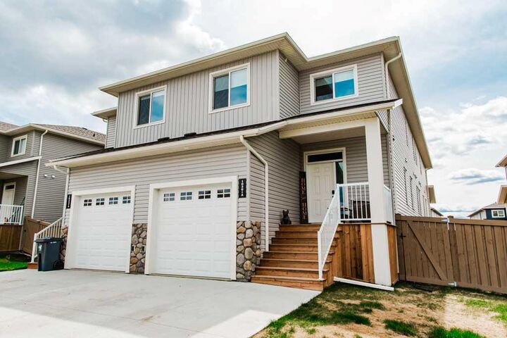 Property Photo:  10301A 149 Avenue  AB T8X 0R8 