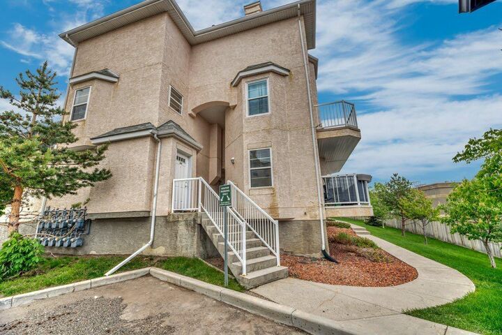 Property Photo:  50 Westland Road 300  AB T1S 1N1 