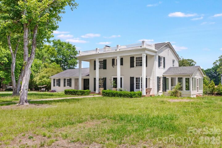 Property Photo:  408 N Providence Street  NC 28173 