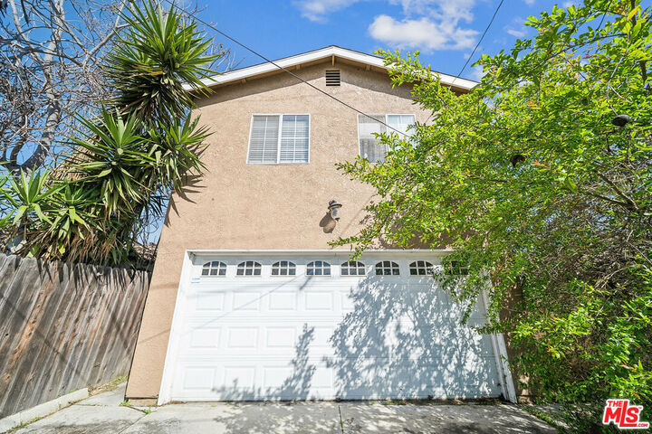 Property Photo: 12221 Athens Way CA 90061