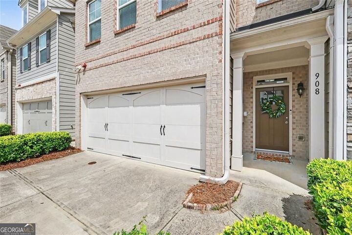 Property Photo:  908 Arbor Crowne Drive  GA 30045 