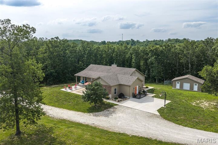Property Photo:  956 Rustling Oaks Lane  MO 63080 
