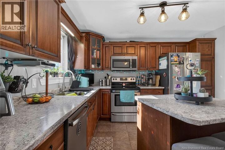 Property Photo: 19 Naples Drive NB E1G 0T5