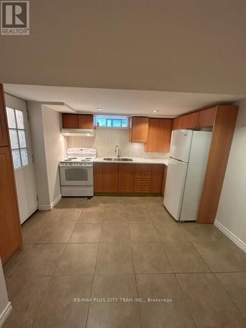 Property Photo: 686 Sammon Avenue Bsmt ON M4C 2E2
