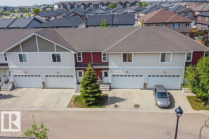 Property Photo:  450 McConachie Way NW 8  AB T5Y 0S8 