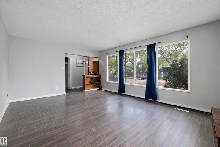 Property Photo:  12303 115 Avenue NW  AB T5H 2Z7 