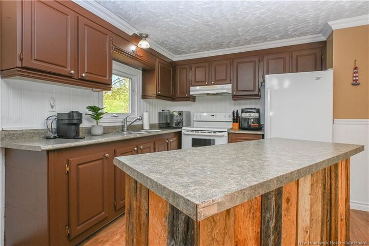 Property Photo:  258 Du Bocage Street  NB E8N 2S8 