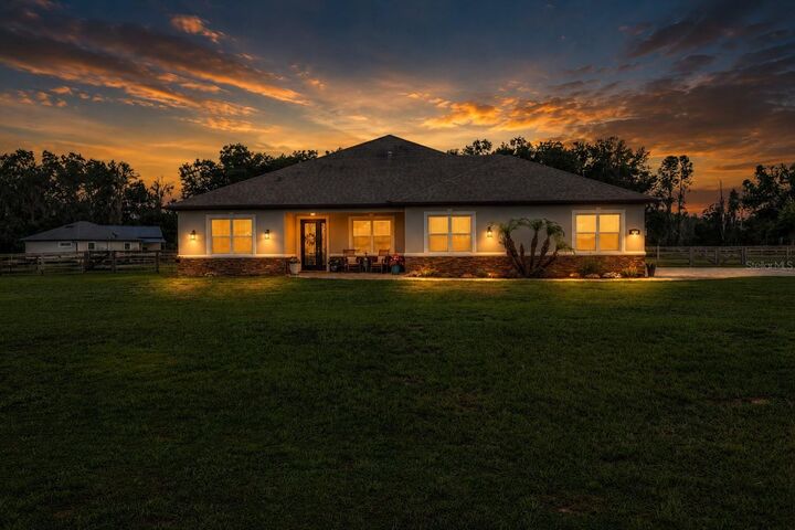 Property Photo:  5020 Lakeshore Ranch Road  FL 34736 