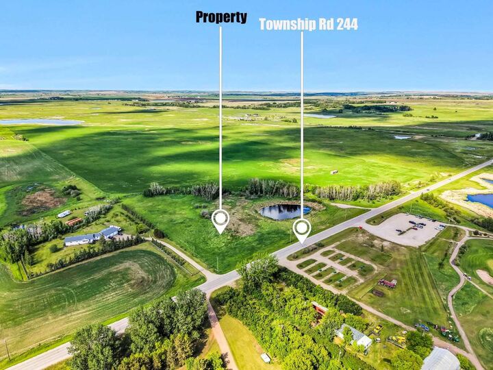 Property Photo:  253032 Township Road 244  AB T1P 1H5 
