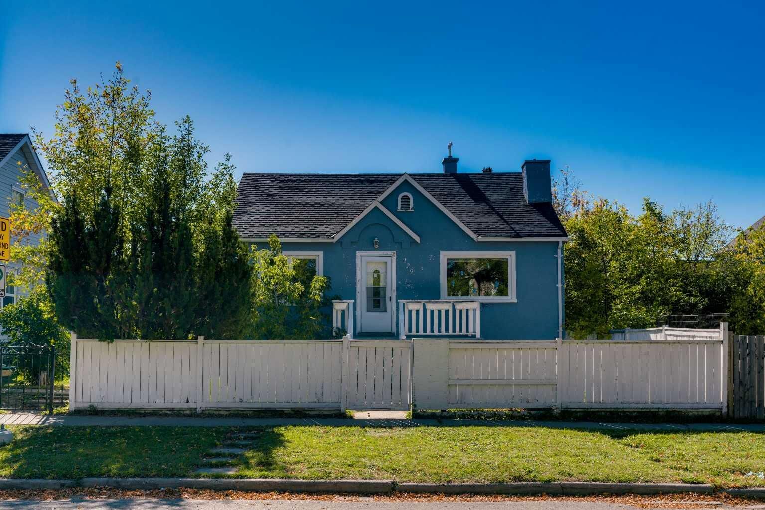 Property Photo: 129 18 Avenue NW AB T2M 0S9