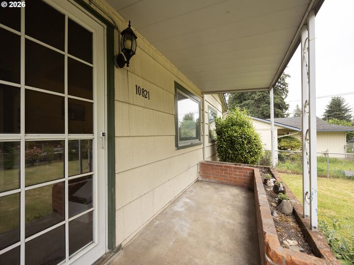 Property Photo:  10821 SE Boise St  OR 97266 