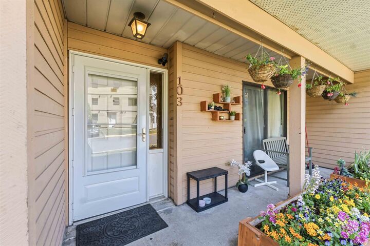 Property Photo: 7139 133A Street 103 BC V3W 8A1