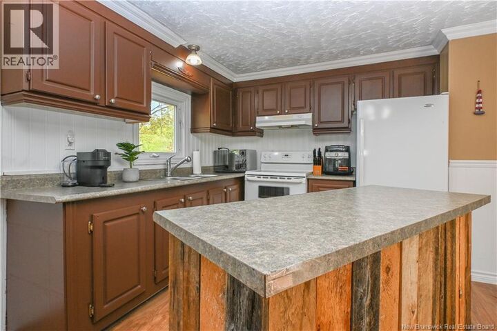 Property Photo:  258 Du Bocage Street  NB E8N 2S8 