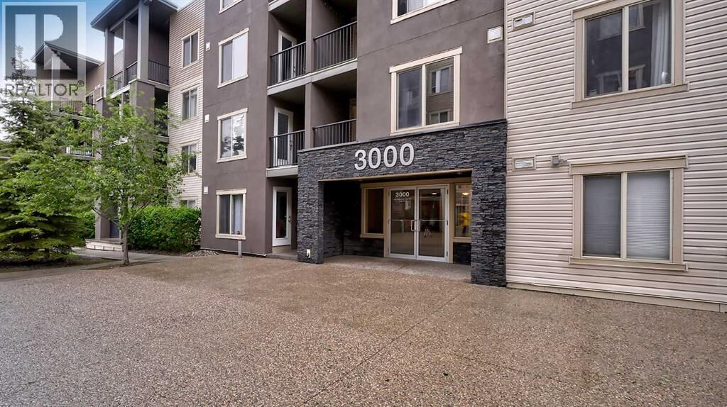 Property Photo:  403 Mackenzie Way Southwest  AB T4B 3V7 