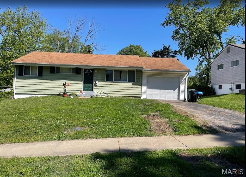 Property Photo:  7753 Paddington Drive  MO 63121 