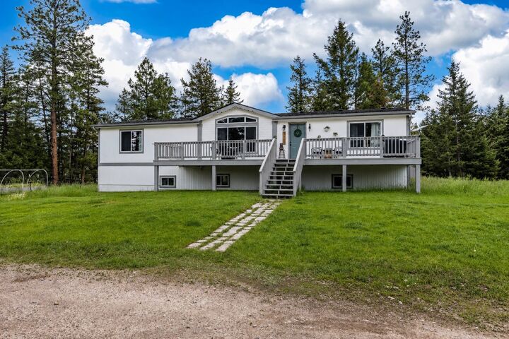 Property Photo:  1762 Copper Cliff Drive  MT 59823 