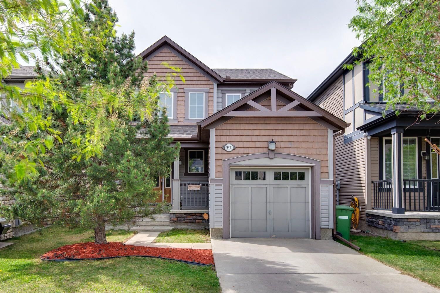 Property Photo: 943 Windsong Drive SW AB T4B 0N5