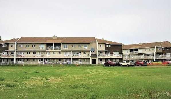 Property Photo:  201 12 Avenue SW 301  AB T0G 2A4 