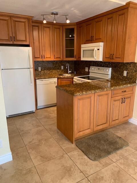 Property Photo:  1907 NE 2nd Street 2  FL 33441 