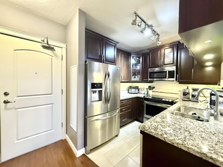 Property Photo:  12655 190A Street 209  BC V3Y 0E9 