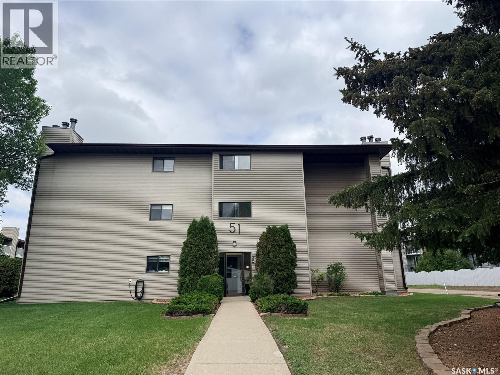 Property Photo:  201 51 Wood Lily Drive  SK S6J 1H1 