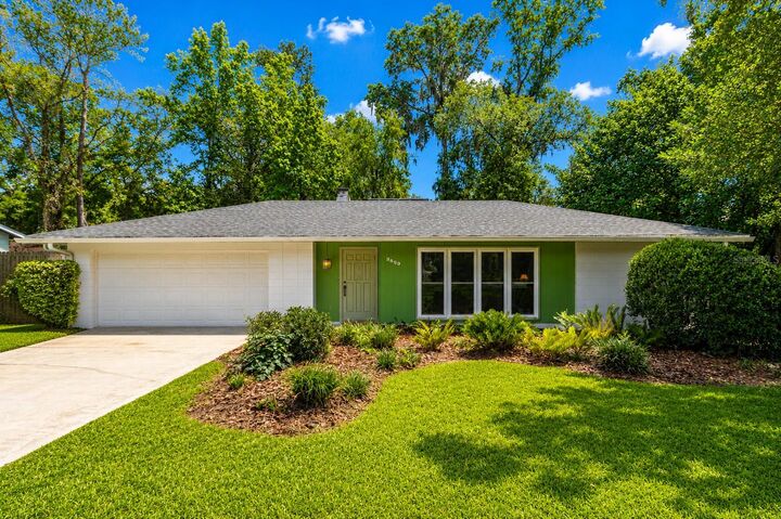 Property Photo:  3859 NW 32nd Pl  FL 32606 