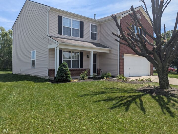 Property Photo:  5567 Washington Avenue  IN 46106 