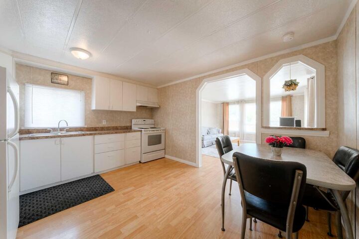 Property Photo: 6220 17 Avenue SE 235 AB T2A 0W6