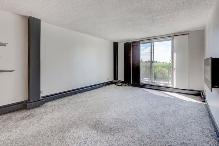 Property Photo:  80 Galbraith Drive SW 21B  AB T3E 3H2 
